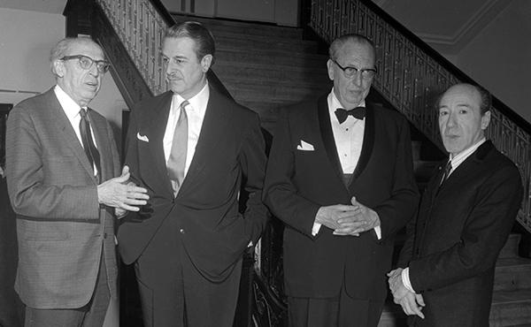 four men in suits